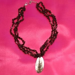 3 strand burgundy bead necklace with pendant